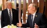Tổng thống Trump và Tổng thống Putin trò chuyện trong lễ khai mạc Hội nghị Thượng đỉnh G20 tại Hamburg (Đức) hôm 7/7. Ảnh: Reuters