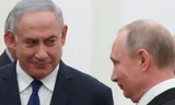 Tổng thống Nga Putin (phải) và Thủ tướng Israel Netanyahu (trái). Ảnh: Reuters