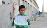 [ẢNH] Nụ cười con trẻ và cái giá của những cuộc chiến tranh