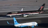 Tận thấy chuyên cơ hoành tráng của ông Trump và bà Hillary