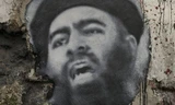 Chân dung thủ lĩnh IS al-Baghdadi. Ảnh: Sputnik