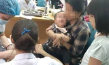 Chỉ trong hai ngày, 1500 trẻ ở Bắc Ninh đã được cha mẹ đưa xuống bệnh viện ở Hà Nội để xét nghiệm xem có bị nhiễm sán lợn hay không sau vụ việc cho trẻ mầm non ăn 'thịt bẩn, gà thối'.