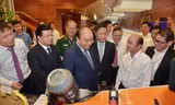 Thủ tướng Nguyễn Xuân Phúc dự hội nghị phát triển ngành cơ khí. (ảnh N.B)
