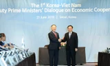 Phó Thủ tướng Vương Đình Huệ và Phó Thủ tướng Hàn Quốc Hong Nam Ki 