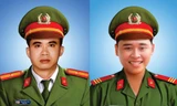 Di ảnh 2 cán bộ chiến sĩ Công an quận Sơn Trà (TP Đà Nẵng) vừa hi sinh khi làm nhiệm vụ. 