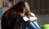 Cách nào giúp trẻ vượt qua trầm cảm tuổi học đường?