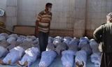 Xác người thiệt mạng trong vụ tấn công vũ khí hóa học Syria hôm 21/8/2013