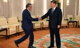 Tổng giám đốc WHO Tedros Adhanom Ghebreyesus gặp Chủ tịch Trung Quốc Tập Cận Bình trong chuyến thăm cuối tháng 2 Ảnh: Reuters 