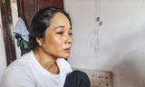 Chị Huỳnh Thị Phượng (40 tuổi, vợ anh Đô) khóc đỏ mắt khi nghe tin chồng mất tích. Ảnh: Trương Định