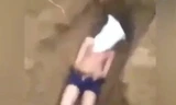 Kinh hoàng clip nam thanh niên bị nhóm người tra tấn, vùi đất chôn sống