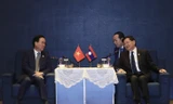 Chủ tịch nước Võ Văn Thưởng gặp Tổng Bí thư, Chủ tịch nước Lào Thongloun Sisoulith ngày 19/10 tại Bắc Kinh. (Ảnh: TTXVN)