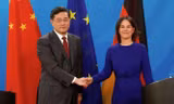 Ngoại trưởng Trung Quốc Tần Cương trong cuộc gặp người đồng cấp Đức Annalena Baerbock. (Ảnh: Getty)