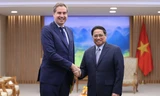 Thủ tướng Phạm Minh Chính tiếp ông Olivier Becht, Bộ trưởng đặc trách Ngoại thương, Thu hút kinh tế và người Pháp ở nước ngoài. (Ảnh: Chinhphu.vn)