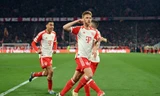 Kimmich ăn mừng sau khi ghi bàn vào lưới Arsenal.