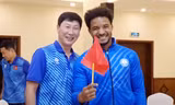 Nguyễn Xuân Son và HLV Kim Sang-sik.
