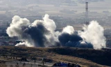 Khói bốc lên từ khu vực Sinjar sau một chiến dịch chống khủng bố của lực lượng người Kurd ở miền bắc Iraq. (Nguồn: AFP/TTXVN)