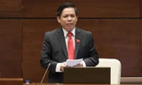 Quốc hội chất vấn Bộ trưởng Nguyễn Văn Thể về dự án đội vốn, chậm tiến độ. Ảnh Như Ý