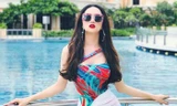 Hoa hậu Hương Giang 'đốt mắt' fans với bikini một mảnh