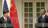 Tổng thống Mỹ Barack Obama (phải) và Chủ tịch Trung Quốc Tập Cận Bình (trái) tại cuộc họp báo chung ở Nhà Trắng ngày 25/9. (Nguồn: TTXVN).