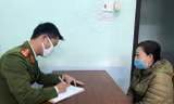 Bà Nguyễn Thị H. tại cơ quan công an.