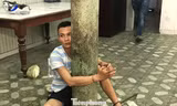 Tạ Quang Ngọ tại công an.