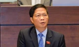 Bộ trưởng Công thương Trần Tuấn Anh trả lời câu hỏi chất vấn của đại biểu. Ảnh: Như Ý