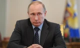 Tổng thống Nga Vladimir Putin bị giảm thu nhập. Ảnh: ITAR-TASS 