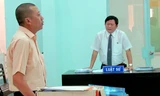 Ông Nguyễn Phong Quang, Giám đốc Cty Rồng Việt và luật sư Trần Đình Triển tại phiên tòa. Ảnh: Nguyễn Đình Quân
