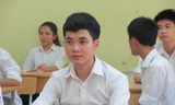 Thí sinh dự thi tốt nghiệp trung học phổ thông môn ngữ văn năm 2014. (Ảnh: Phạm Mai/Vietnam+) 