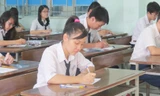 Học sinh làm bài thi tốt nghiệp 2014 ở TPHCM. Ảnh: Nguyễn Dũng