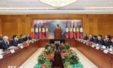 Dành ưu tiên cao nhất cho việc củng cố và tăng cường quan hệ Việt Nam-Lào