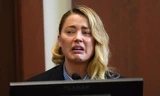 Amber Heard bật khóc trước tòa khi nói về lần đầu bị Johnny Depp bạo hành