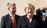 Thủ tướng Đức Angela Merkel và Phu quân. (Ảnh: Reuters)