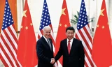 Ông Joe Biden và ông Tập Cận Bình trong cuộc gặp hồi năm 2013. (Ảnh: Reuters)