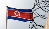 Quốc kỳ Triều Tiên bên tại Đại sứ quán Triều Tiên ở Malaysia. (Ảnh: Reuters)