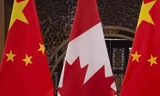 Quốc kỳ Trung Quốc và Canada. (Ảnh: Reuters)