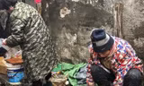 Một hàng bán và giết mổ động vật hoang dã ở chợ Hoa Nam, Vũ Hán. (Ảnh: Simon Song)