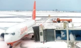 Tuyết bao phủ sân bay Jeju (Hàn Quốc). Ảnh: Getty Images