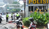 Hiện trường vụ tấn công đồn cảnh sát giao thông gần một trung tâm mua sắm ở Jakarta. Ảnh: Xinhua