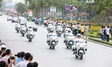 Lực lượng CSGT cùng đặc vụ dẫn đoàn Tổng thống Obama trên đường Nguyễn Chí Thanh-Hà Nội sáng ngày 23/5. Ảnh: Như Ý