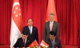 Thủ tướng Nguyễn Xuân Phúc và Thủ tướng Singapore Lý Hiển Long chứng kiến lễ ký các văn kiện hợp tác​. Ảnh: VGP.