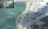 Cộng đồng quốc tế lo ngại tình trạng quân sự hóa trên biển Đông hiện nay. Trong ảnh: Trung Quốc triển khai tên lửa đất đối không trên đảo Phú Lâm thuộc quần đảo Hoàng Sa của Việt Nam. Ảnh: Stratfor