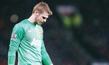 Thủ môn De Gea không có tên trong danh sách thi đấu của M.U ở 2 trận đầu tiên của mùa giải. Ảnh: PA
