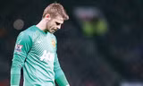 Thủ môn De Gea không có tên trong danh sách thi đấu của M.U ở 2 trận đầu tiên của mùa giải. Ảnh: PA