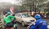 Cuộc “hôn phối” giữa Uber và Grab đã đưa Grab lên nắm quyền kiểm soát thị trường xe công nghệ. Ảnh: Bảo An.