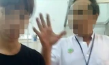 Ảnh cắt từ video clip cho thấy điều dưỡng đang mắng người nhà bệnh nhi. 