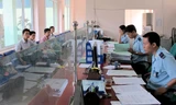 Bộ Tài chính hứa sẽ tiếp tục cải cách thủ tục thuế, hải quan để tạo thuận lợi cho doanh nghiệp. Ảnh: HQ