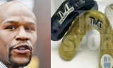 Floyd Mayweather và những miếng bảo vệ răng đặc biệt của mình. Ảnh: TMZ