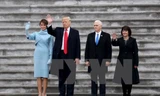 Tân Tổng thống Donald Trump (thứ hai, trái), tân Phó Tổng thống Mike Pence (thứ hai, phải) sau lễ tuyên thệ nhậm chức tại Washington, DC. Ảnh: EPA/TTXVN.