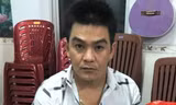 Hồ Tấn Ý khi bị bắt giữ, rạng sáng 16/10. Ảnh: Đức Huynh.